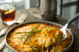 Golden and cheesy hashbrown casserole fresh out of the oven