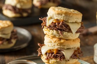 Freshly baked French dip biscuits served with a side of warm au jus for dipping